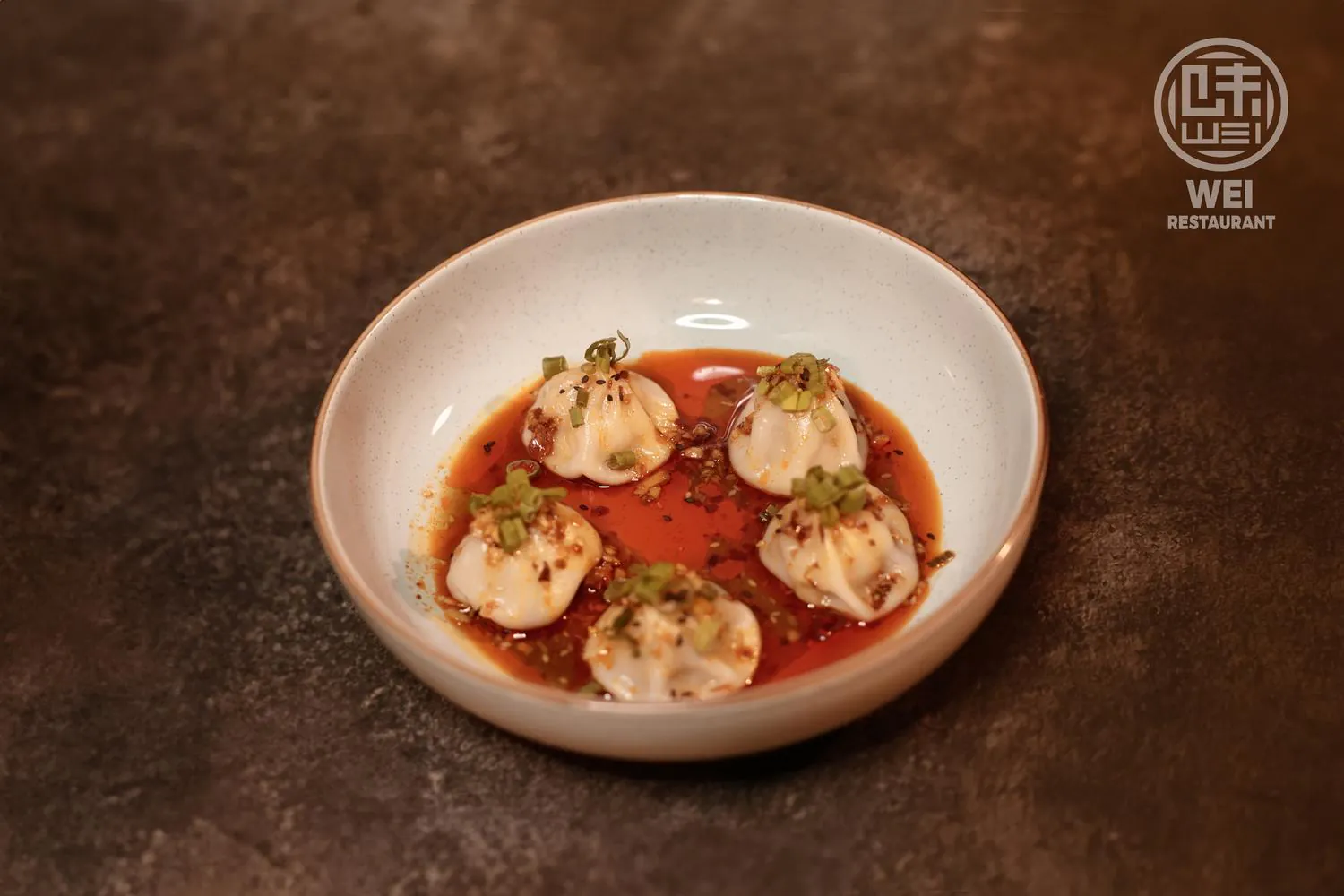 Pork wontons in spicy red oil with chili and scallions at Wei Restaurant, a Chinese Restaurant in Anchorage